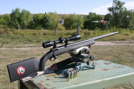 Savage Model 10 long range nightforce rifle in 6.5 Creedmoor mounting a Nikon tactical long range optic.