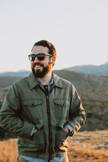 a man wearing sunglasses and huckberry